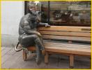 Steer Sitting Outside<BR> Steak House
